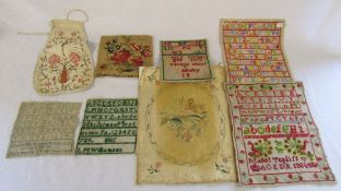 Quantity of unframed Victorian samplers and needle