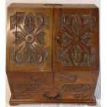 Late Victorian carved stationery box with internal calendar and two inkwells size approximately 34