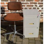 Low level filing cabinet and a swivel chair
