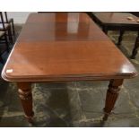 Victorian mahogany wind out dining table on reeded legs with 2 leaves extending 222cm by 118cm