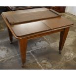 Wind out oak dining table with one leaf