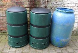 2 compost bins and a water barrel