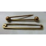 2 9ct gold pins (1 af) total weight 2.9 g