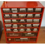 Small cabinet containing watch makers parts, tools, etc