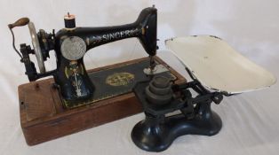 Kitchen scales with enamel pan and weights and Singer sewing machine