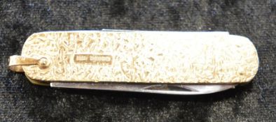 9ct gold cased pen knife. Total weight 28g