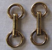 Pair of 9ct gold snaffle bit style cufflinks L 37 mm total weight 9.9 g