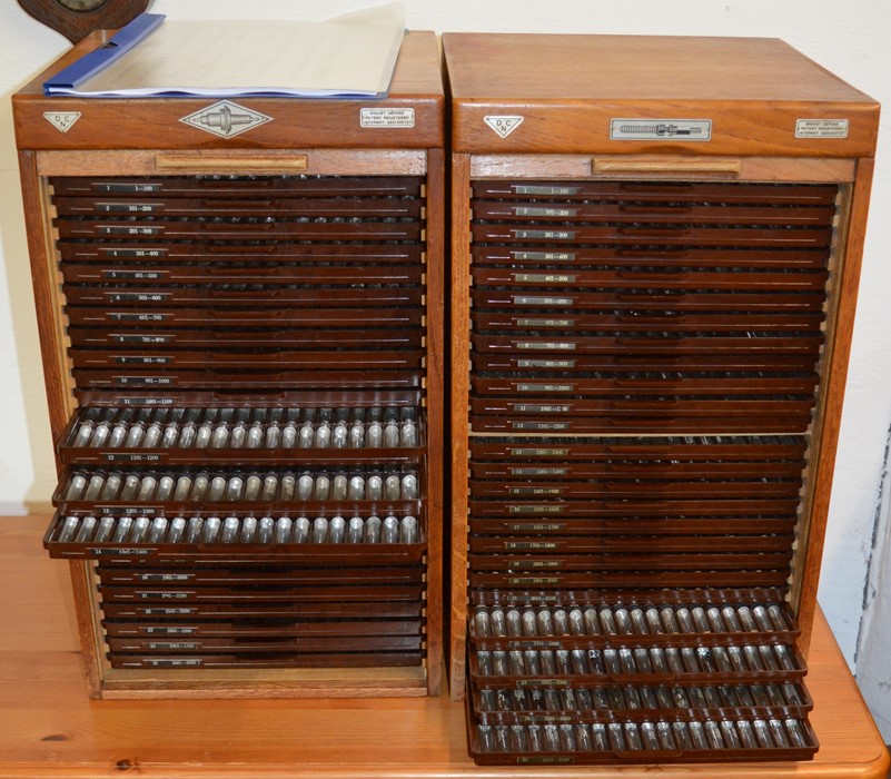 Pair of DCN tambour front cabinets containing watch parts Ht 47cm