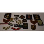 Various military style cloth badges