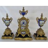 Continental gilt metal and porcelain clock with garniture complete with stands H 42 cm (missing
