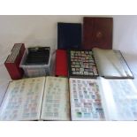 Quantity of stamp albums and mint stamps in box