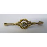 Tested as 15ct gold brooch with 0.10 ct diamond solitaire total weight 4.2 g
