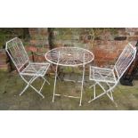 Wrought iron folding patio table and 2 chairs