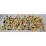 Approximately 62 Cherished Teddies figures with a bag of certificates