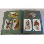 Postcard album containing approximately 300 artists cards relating to animals from early 1900s