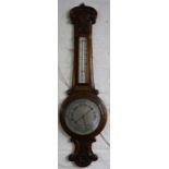 Early 20th century carved aneroid barometer