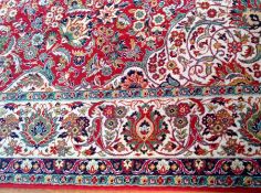 Persian Bagdhad wool carpet 9ft8in by 13ft (2.96x3.96m)