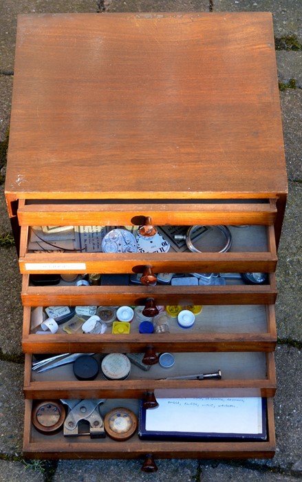 Small wooden 6 drawer cabinet containing watch parts, tools & small tins