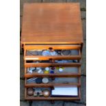 Small wooden 6 drawer cabinet containing watch parts, tools & small tins
