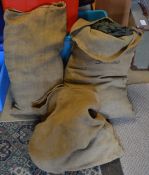 2 sacks of camouflage netting and a sack of milita