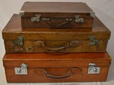 3 vintage leather suitcases