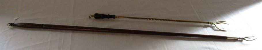 Large toasting fork with wooden handle & a twisted brass handled toasting fork