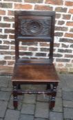 17th century oak chair with carved roundel back panel