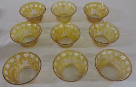 Set of 9 Bohemian amber cut through to clear glass bowls decorated with stags, floral cartouches and