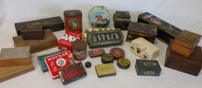 Selection of old tins and wooden boxes