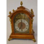 19th century mantel clock in an oak case with ormolu mounts Ht 36cm