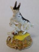 19th century Staffordshire figure of a goat and dog on naturalistic hand-painted base height 11cm