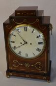 Regency mahogany & brass inlaid mantel clock with back plate engraved John Spyere London, lion