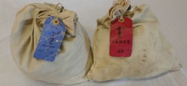 2 large bags of 1/2 pence and 1 pence coins