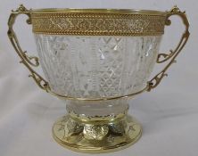 Victorian silver gilt and cut glass bowl in the Gothic revival style with thin scroll handles,