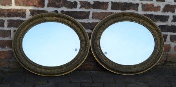 Pair of oval gilt framed mirrors