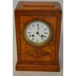 Mixed wood Art Deco mantel clock with enamel dial Ht 30cm
