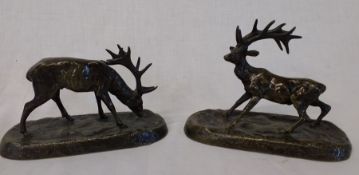 Pair of bronze stag figurines on oval bases width 16cm