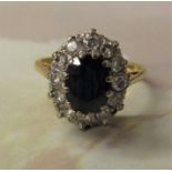 18ct gold sapphire and diamond oval cluster ring (sapphire approximately 1.4 ct, diamond total 0.