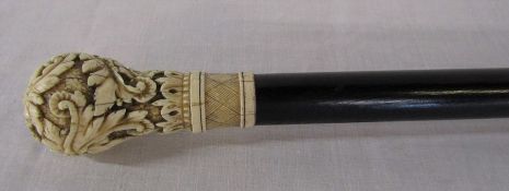 Ebony walking stick with carved ivory handle