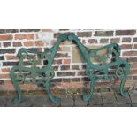 Pair of cast iron bench ends with lion head arms