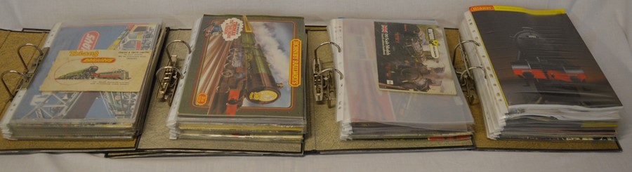 4 folders containing Triang & Hornby catalogues from 1955 to 1999 - 1st edition to 45th edition plus