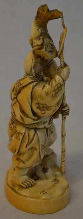 Meiji period carved ivory okimono depicting a fisherman with carp above his head Ht 13cm - Image 4 of 5