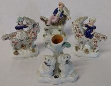 Pair of small Staffordshire figures girls on goats (chip to hat, slight damage to top of one horn,