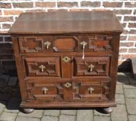 Late 17th century geometric oak chest of drawers with drop handles on bun feet H 85cm W 90cm D 51cm