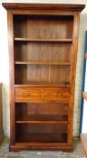 Modern bookcase with frieze drawer