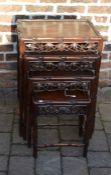 Nest of 4 Chinese carved ebony tables