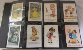 Album of postcards and story cards relating to childhood dating from early 1900 onwards inc