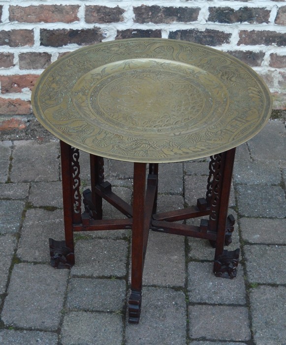 Oriental brass top folding table