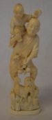 Ivory Meiji period okimono of man with a child on his shoulders & a cockerel at his feet Ht 23cm