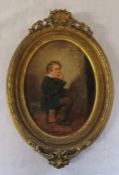 Gilt framed oval oil on board of a young boy eating fruit by Edward Charles Barnes signed Barnes